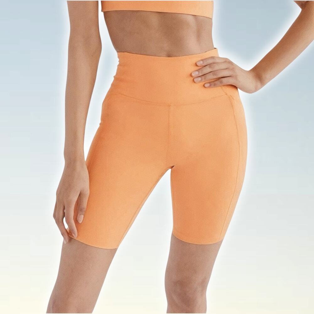 GIRLFRIEND COLLECTIVE High Rise Pocket Bike Short in Orange Sz Small
